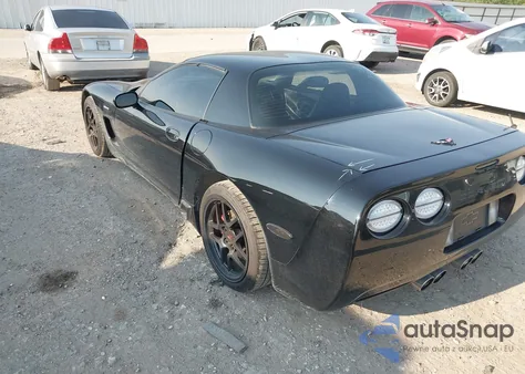 2001 Chevrolet Corvette Z06 Hardtop из США, поврежденный, VIN 1G1YY12S515117747